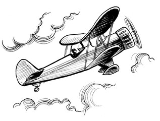 Flying vintage biplane. Ink black and white drawing © berdsigns