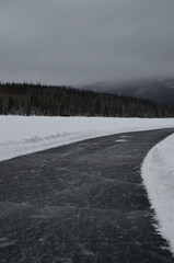 ice rink on frozen mountain lake