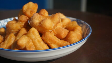 Chinese Bread Stick, The breakfast made from fried flour is called Patongo on plate.