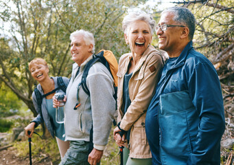 Fototapeta Nature, hiking and happy senior friends bonding, talking and laughing at comic joke in forest. Happiness, fun and group of elderly people trekking together for health, wellness and exercise in woods. obraz