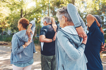 Fitness, nature and senior people doing stretching exercise before cardio training in a park. Health, wellness and active group of elderly friends in retirement doing arm warm up for outdoor workout. - obrazy, fototapety, plakaty