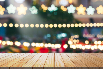 Wooden table in front of abstract blurred restaurant with bokeh lights background