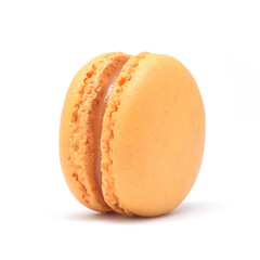 French popular dessert meringue or almond cookie with filling cream or jam macaroons yellow and closed up isolated on white