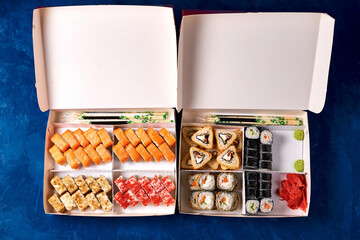 japanese rolls, sushi in a cardboard box