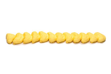 Banana marshmallow candy isolated on a white background.