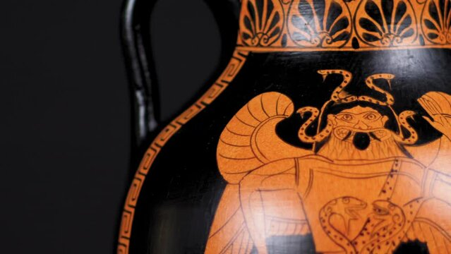 Dolly of a replica Greek Amphora or Vase with Ancient Greek mythological creature on it - Close Up Left to Right