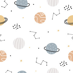 Hand drawn space seamless pattern. Funny colorful planets on a white background. Nursery design of fabric, packaging, labels. Cartoon space. Doodle style.