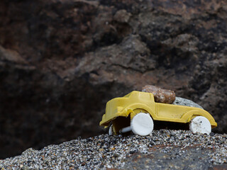 Toy car on the sand