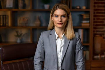 Warm likable commercial friendly portrait of a smart beautiful natural woman, business executive...
