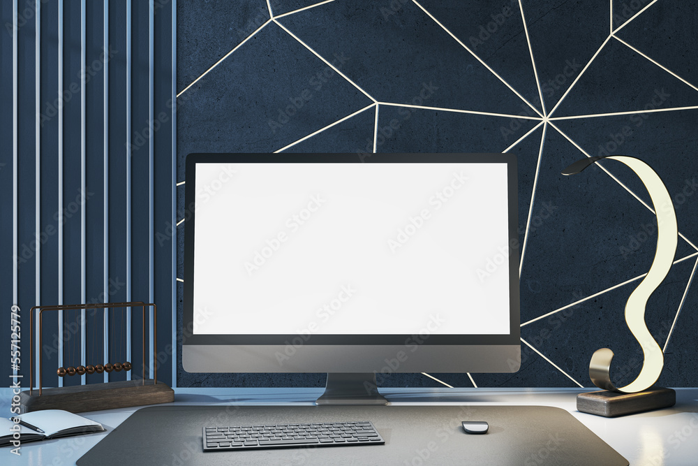 Aufkleber Close up of creative designer desktop with empty white computer monitor, various items and blue wall. Mock up, 3D Rendering.