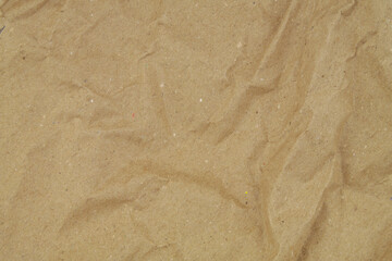 Brown crimpled paper as texture