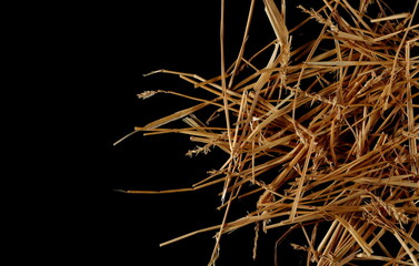 Pile straw isolated on black background and texture, top view