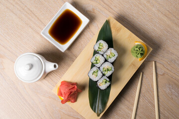 Fototapeta na wymiar japanese sushi, rolls on a wooden board
