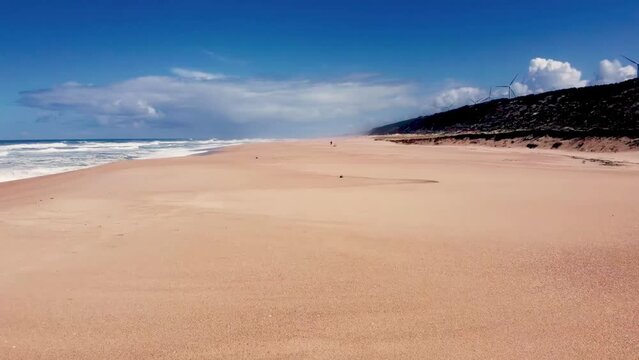 sandy Nazare beach in the morning from an aerial view
