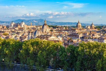 Scenic cityscape of Rome seen from top of St. Angel's castle, Italy