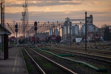Railway Network In Lithuania. Radviliskis is well known railway capital in Lithuania. Beautiful evening sunset light and cars in background.
