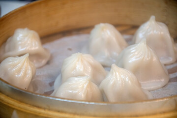 Obraz na płótnie Canvas Steamed pork soup dumplings named Xiao long bao in Taiwan