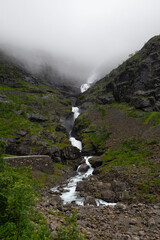 Rough mountain sides around the Trollstigen mountain pass that twists through 11 hairpin bends up the steep mountains of Romsdalen valley, Norway