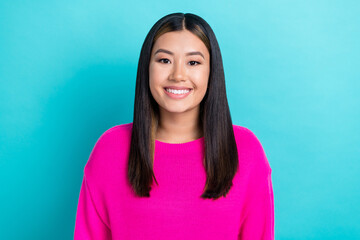 Fototapeta premium Photo portrait of young cheerful korean lady toothy beaming smile optimist good mood wear stylish knitted jumper isolated on blue color background