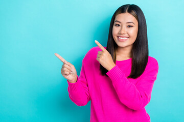 Fototapeta premium Portrait photo of adorable brunette hair japanese lady wear trendy outfit direct fingers hm clothes brand promo isolated on blue color background