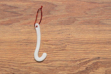 sugar Christmas tree ornaments on a wooden background