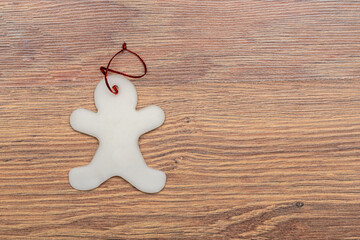 sugar Christmas tree ornaments on a wooden background