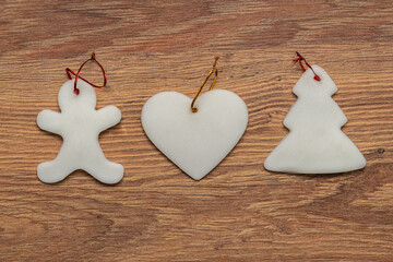sugar Christmas tree ornaments on a wooden background
