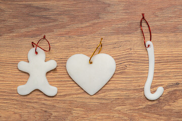 sugar Christmas tree ornaments on a wooden background
