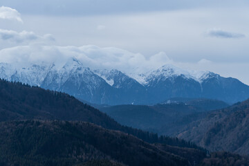Fototapeta na wymiar mountains and clouds, viewpoint from Piatra Mare Mountains to Bucegi Mountains, Romania