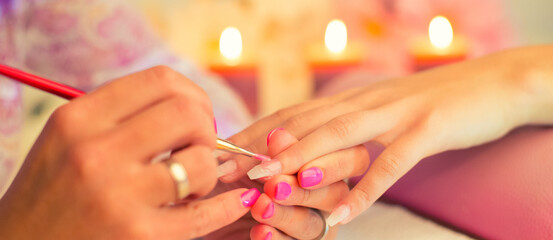 Obraz na płótnie Canvas Manicure process in beauty salon, making of artificial nails