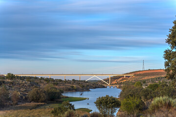 High speed train bridge over the river, long exposure