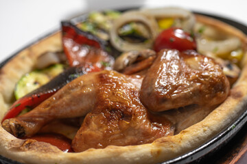 close up of  fried chicken with vegetables