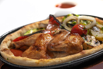 close up of  fried chicken with vegetables