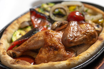 close up of  fried chicken with vegetables