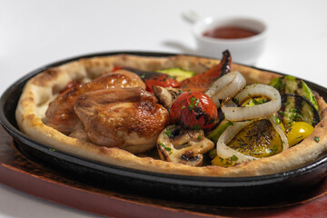 close up of  fried chicken with vegetables