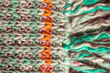 Handmade knit background with detail weave threads.