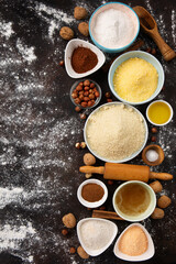 Ingredients for Gluten Free Cookies or Bread on Brown Wooden Background.