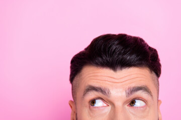 Closeup cropped portrait of young excited interested looking empty space man after barber shop new salon promo isolated on pink color background