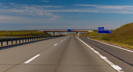 Bridge, roadside and asphalt, blue sky in the city streets in public places.