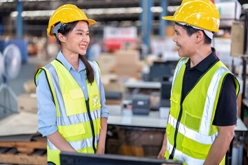 Staff working in large depot storage warehouse trainee check packing box and scan at cashier counter