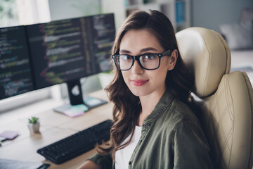 Photo of smart clever confident lady server expert sitting chair developing site install database...