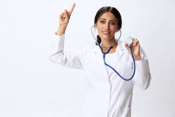 Woman doctor with stethoscope in hand in medical gown on white nurse background, consequences of...