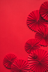 Fototapeta na wymiar Chinese New Year 2023 .Decor pattern fan on red background. Red paper fans .Lunar New Year banner template. Lunar New Year,chinese banner,chinese new year background