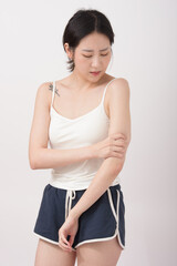 adult woman feels sick, while standing and suffering from unbearable pain.