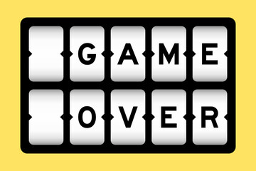 Black color in word game over on slot banner with yellow color background