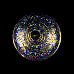 candle in an antique candlestick. candle. golden candlestick of unusual shape