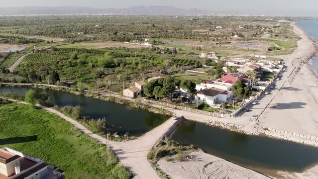 Aerial drone view of Anna river mouth arriving at the Mediterranean Sea