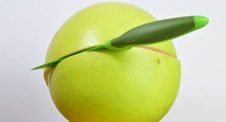 Fruit, sweet pomelo, cut in half.