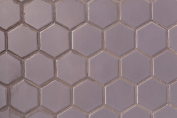 Ceramic wall covering. Beehive pattern.