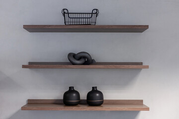 Wall-hung shelves with decorative objects